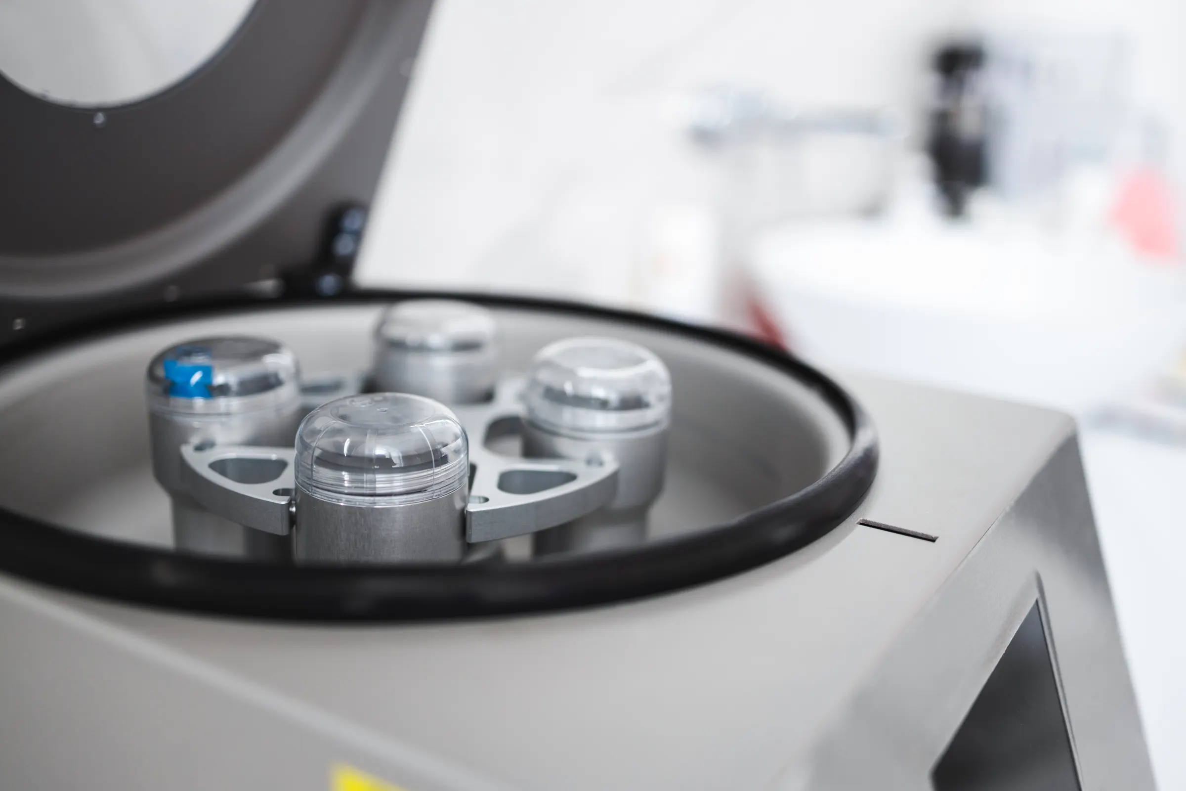 Clean laboratory centrifuge with capped sample tubes