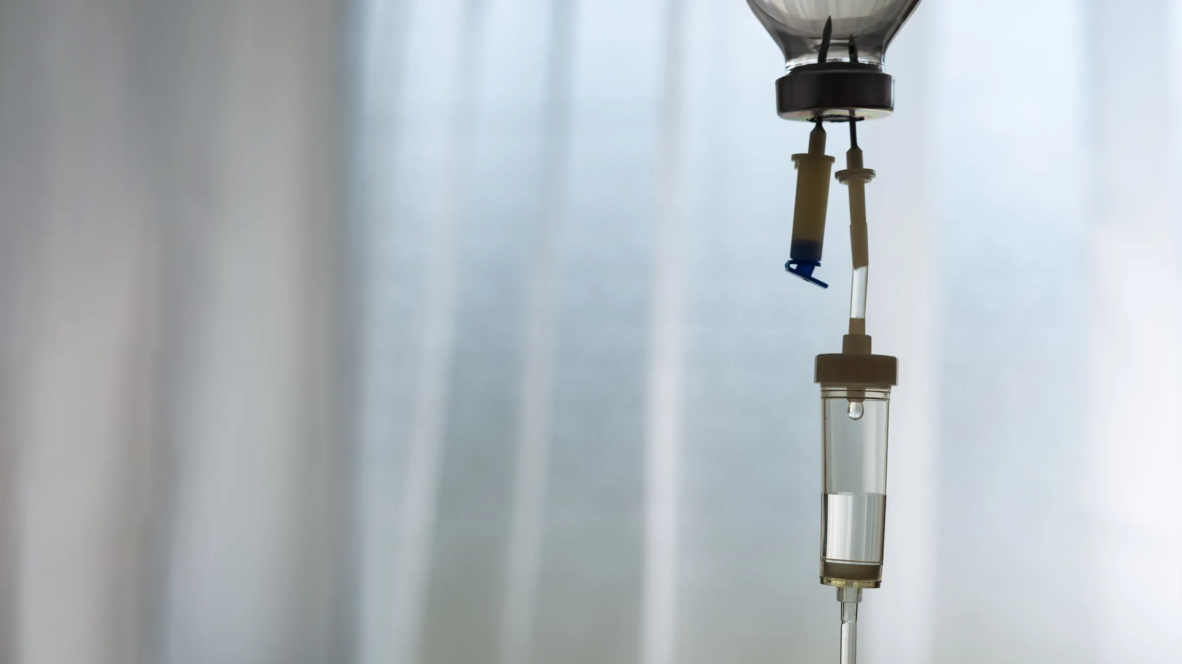 IV drip chamber in soft daylight